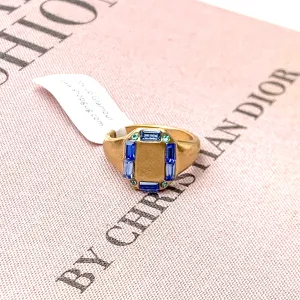 Gold Tone Rectangle Shaped Ring with Mix of Blue Outline Crystals