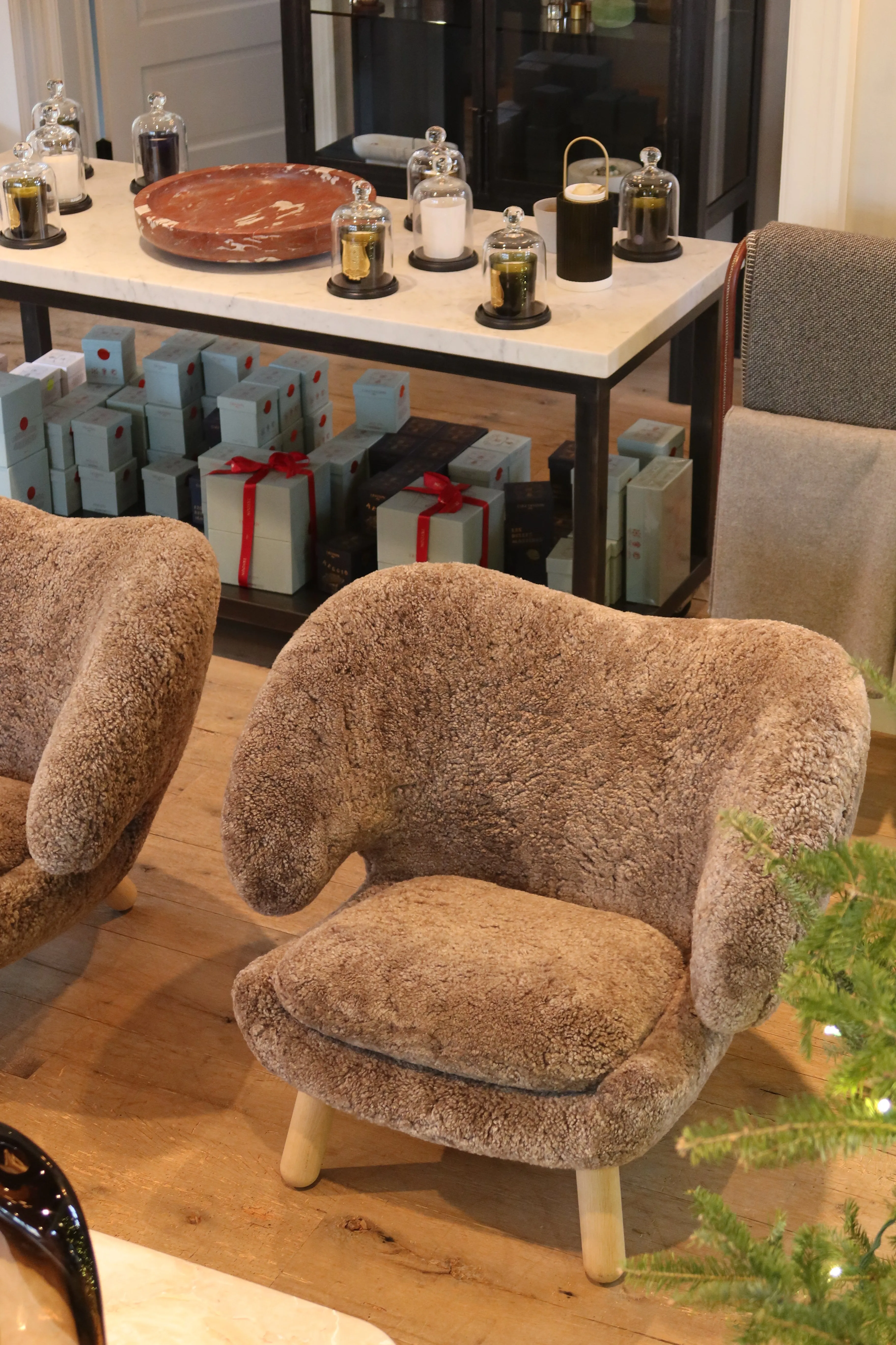 Pair Of Finn Juhl Pelican Chair in Sahara Sheepskin
