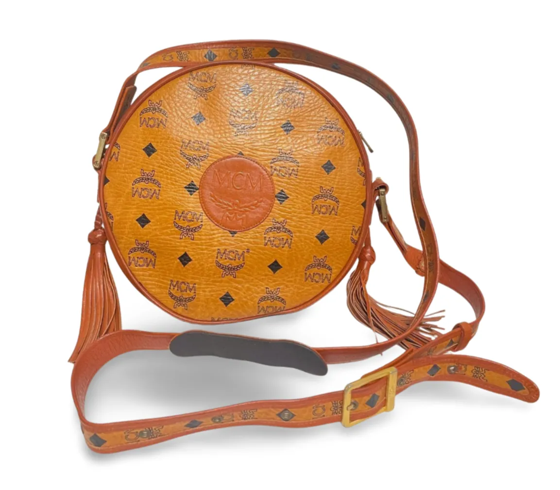 Vintage MCM brown monogram round Suzy Wong shoulder bag with brown leather trimmings. Designed by Michael Cromer. Unisex. 070304ac1