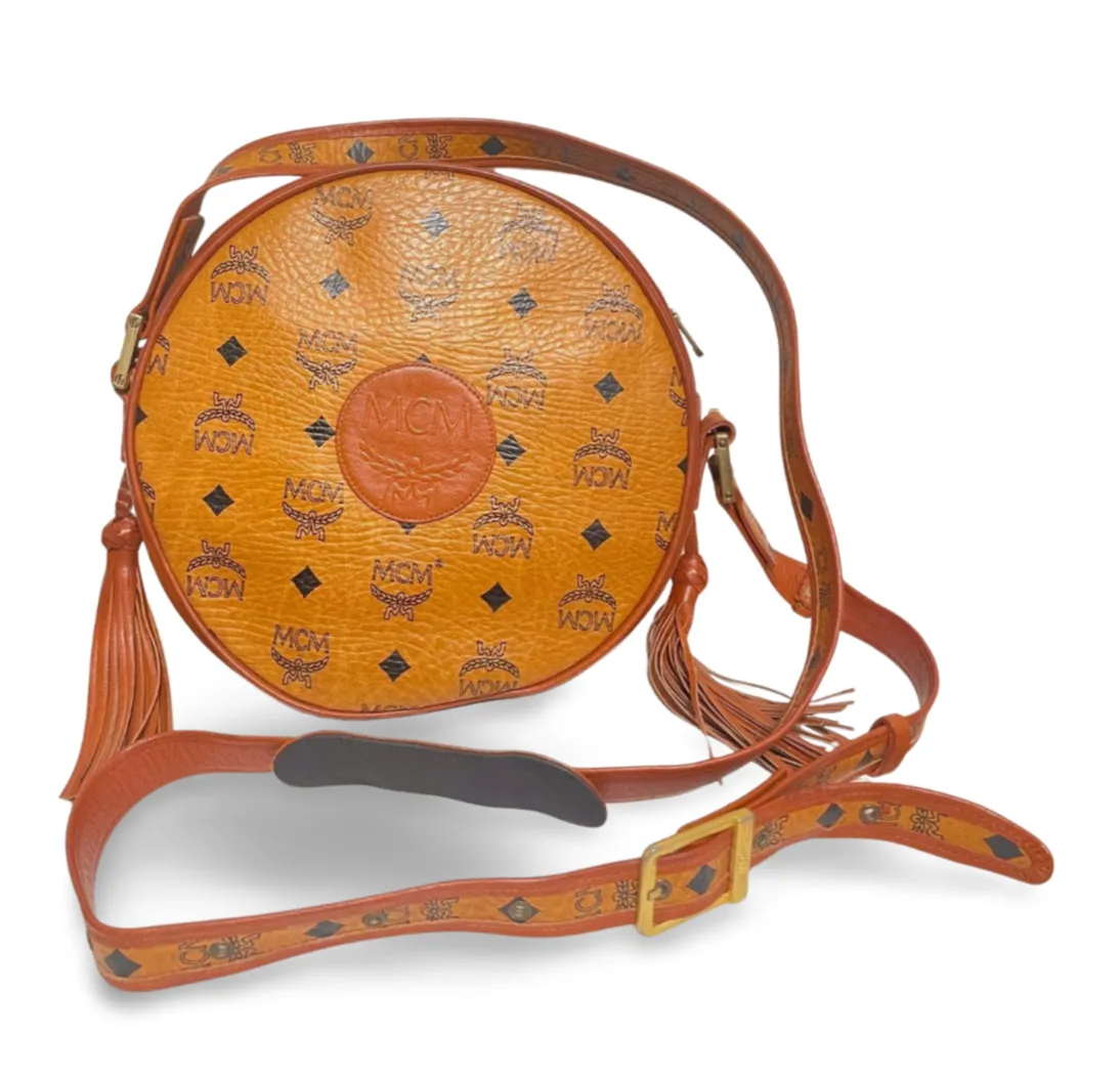 Vintage MCM brown monogram round Suzy Wong shoulder bag with brown leather trimmings. Designed by Michael Cromer. Unisex. 070304ac1