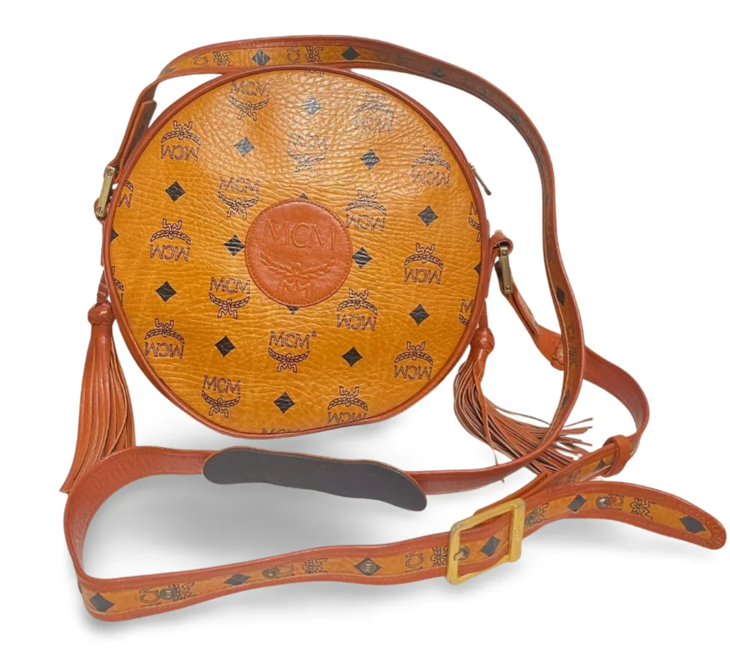 Vintage MCM brown monogram round Suzy Wong shoulder bag with brown leather trimmings. Designed by Michael Cromer. Unisex. 070304ac1