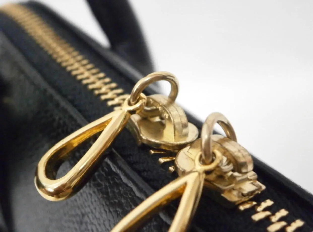 Vintage Valentino Garavani black leather bolide bag with shoulder strap, V logo, a fringe. Classic dialy use purse. 060616r1